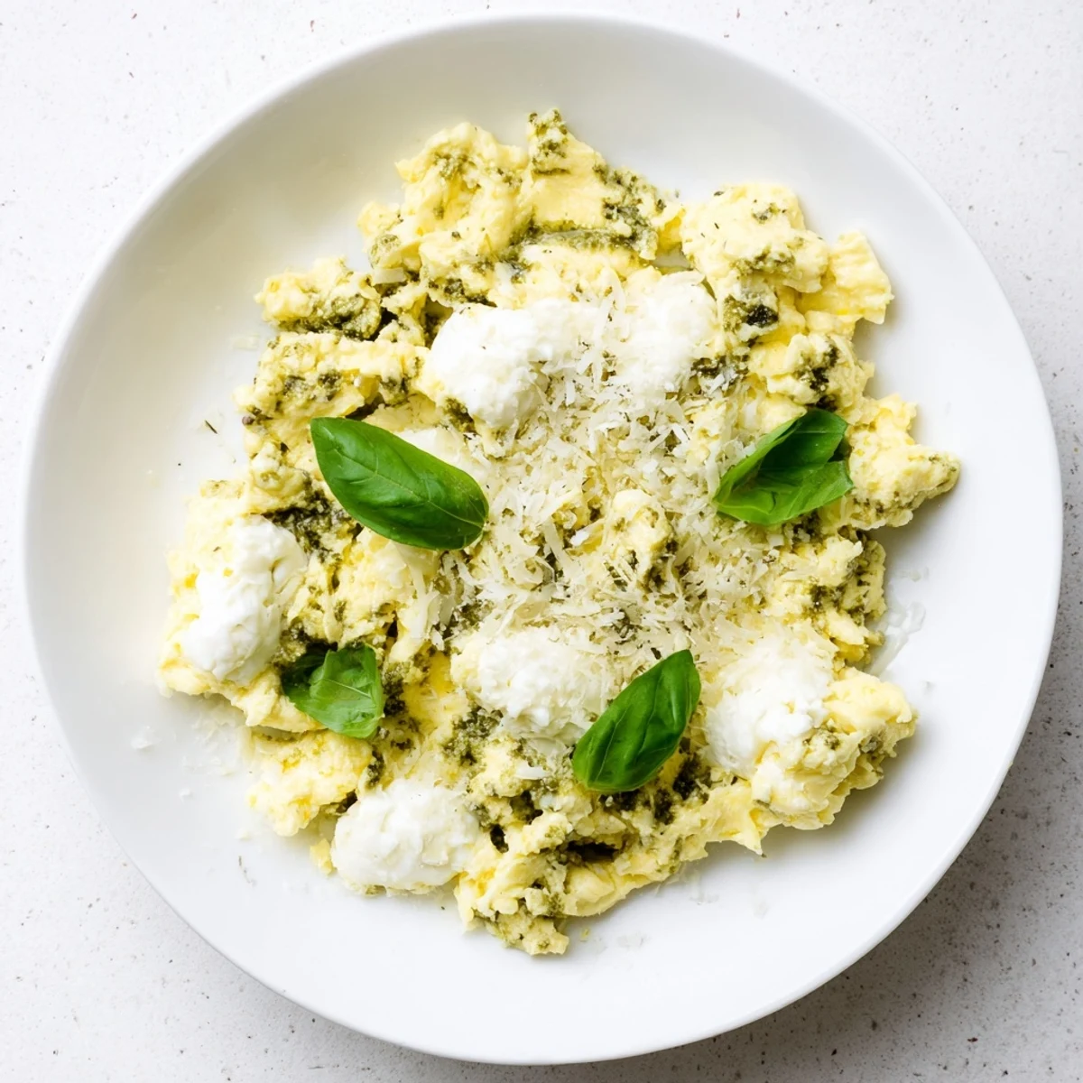 Creamy Pesto Cottage Cheese Eggs, featuring flavorful scrambled eggs with pesto and warm, smooth cottage cheese.
