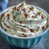 Creamy chipotle lime mayonnaise with smoky heat and zesty lime in a glass jar.