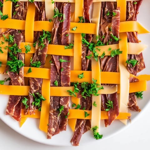 A close-up of The Tartan Plaid, a savory appetizer perfect for any party or gathering.