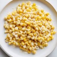 Golden, caramelized Honey Butter Skillet Corn with a creamy, melted cream cheese texture.