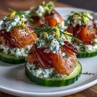 Smoked Salmon Cucumber Bites: refreshing, bite-sized appetizers with creamy dill cheese and salmon.